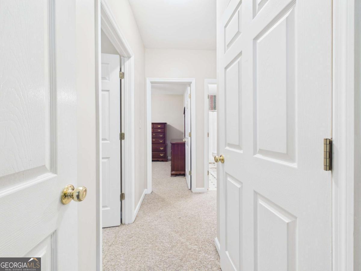 1120 Laurel Pointe Watkinsville, GA 30677 - Photo 38 of 50 a view of a hallway with closet and front door