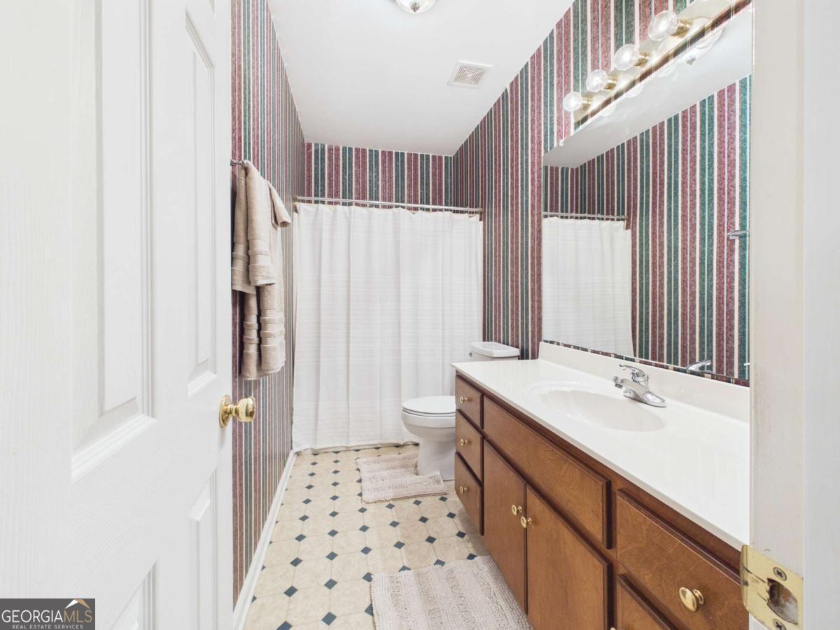 1120 Laurel Pointe Watkinsville, GA 30677 - Photo 41 of 50 a bathroom with a sink a double vanity and a mirror
