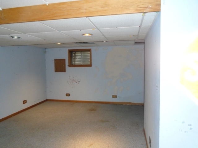 706 Hunters Way Fox River Grove, IL 60021 - Photo 15 of 17 an empty room with wooden floor