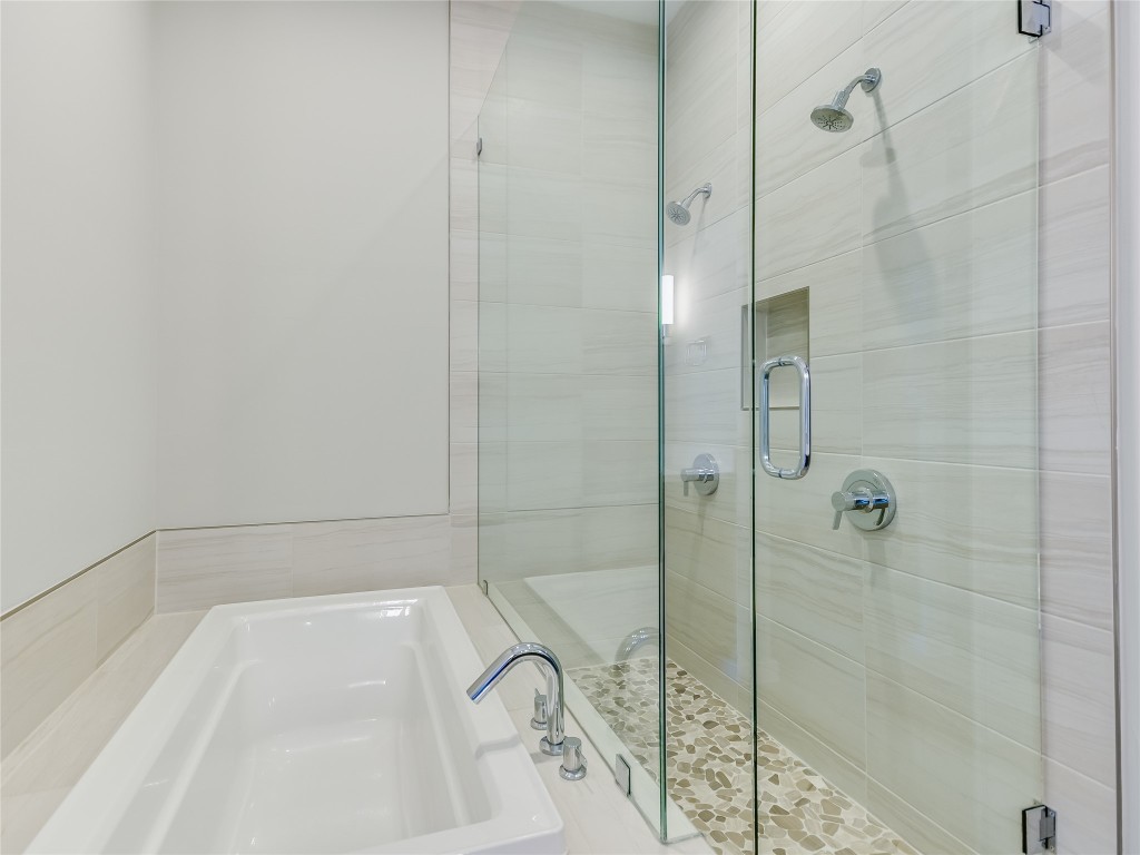 5921 Hiline Road, Unit 2402 Austin, TX 78734 - Photo 10 of 31 a bathroom with a bathtub and shower