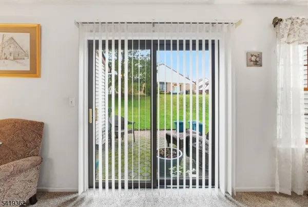a view of a porch with a backyard