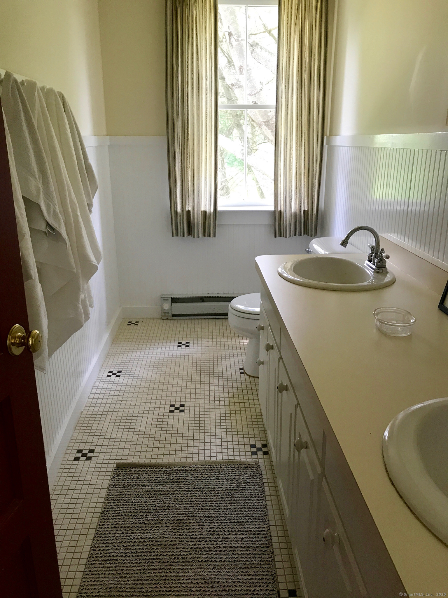 308 Twin Lakes Road Salisbury, CT 06068 - Photo 16 of 20 a bathroom with a sink and a window