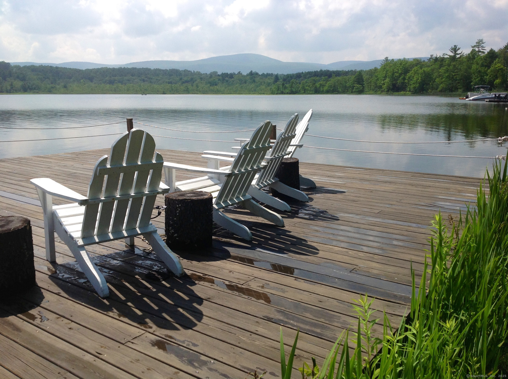 308 Twin Lakes Road Salisbury, CT 06068 - Photo 18 of 20 a view of a lake with outdoor seating