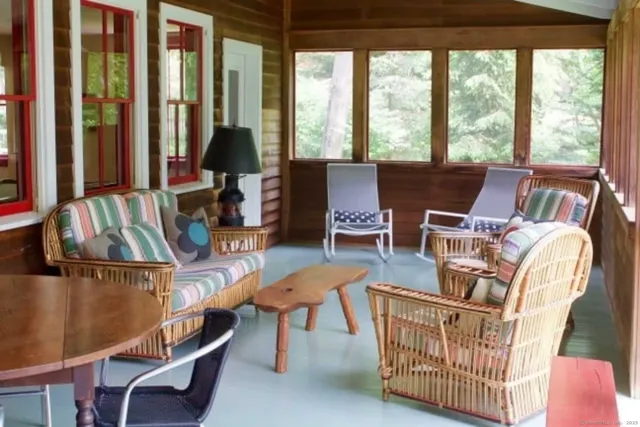 a view of a dining room with furniture window and outside view