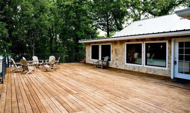 a view of swimming pool with lounge chair