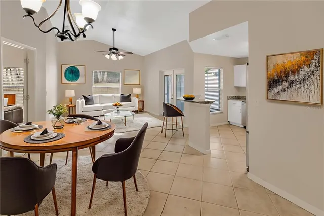 a open kitchen with cabinets and stainless steel appliances