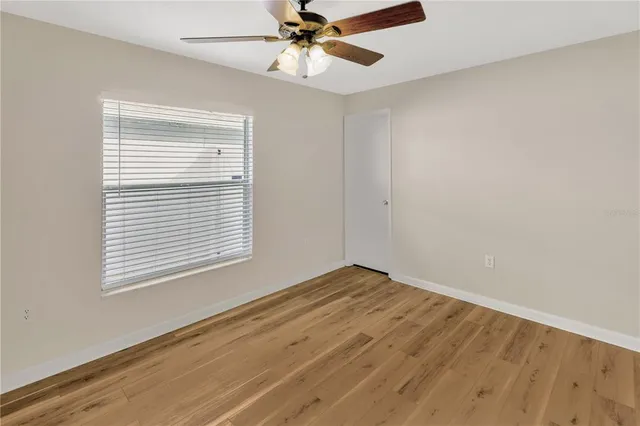 a room with furniture and a wooden floor