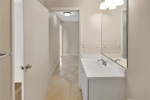 a bedroom with bed and window