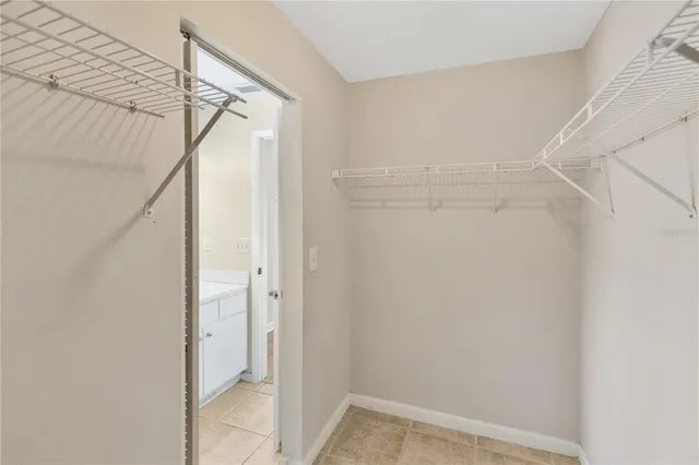 a view of a bathroom from a hallway