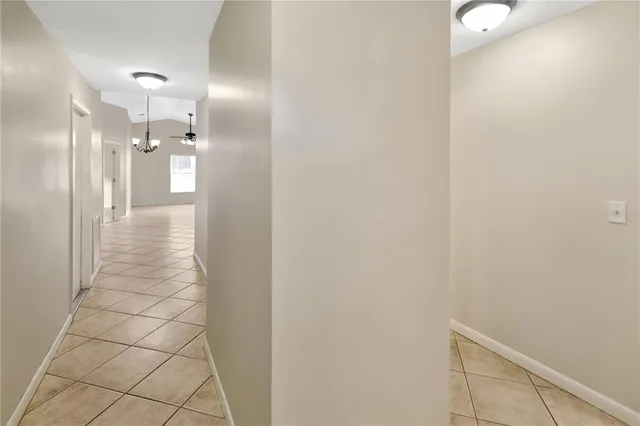 a view of a storage & utility room with a washer dryer