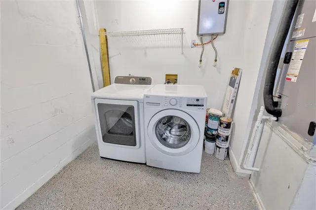 a view of an empty room with windows