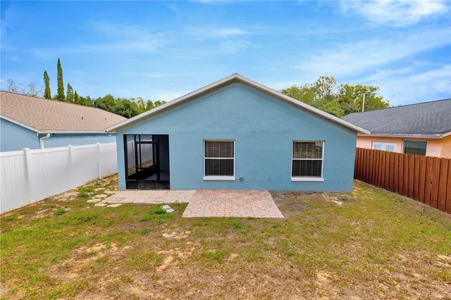a swimming pool with wooden fence