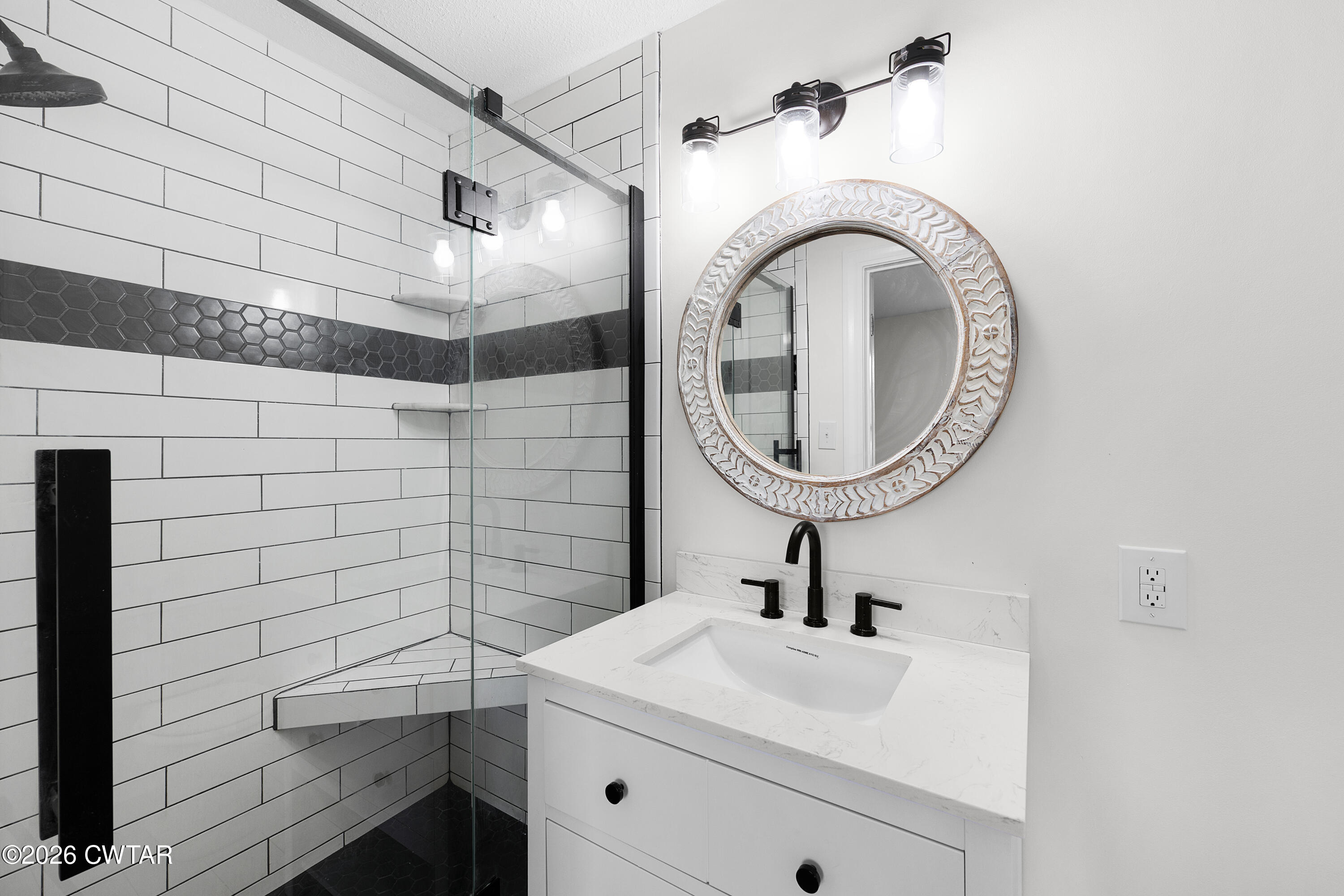 3075 Old Huntingdon Road Lexington, TN 38351 - Photo 9 of 19 a bathroom with a sink a toilet and a mirror