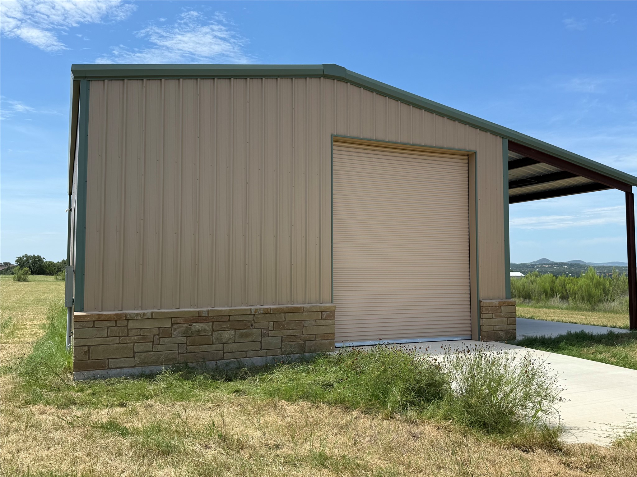 679 Palomino Springs Bandera, TX 78003 - Photo 1 of 13 a view of backyard with garden