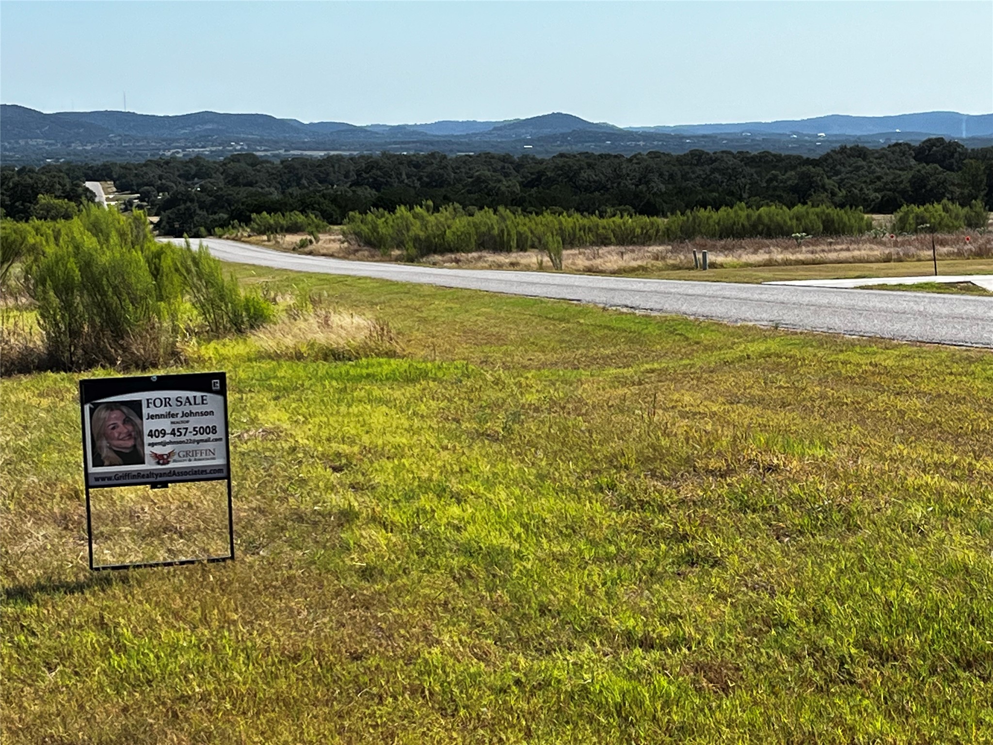 679 Palomino Springs Bandera, TX 78003 - Photo 5 of 13 a view of a city from a yard