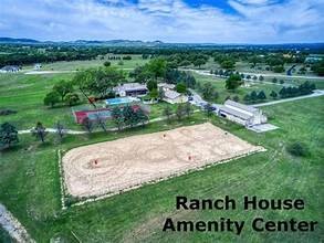 679 Palomino Springs Bandera, TX 78003 - Photo 10 of 13 a view of a street with a park