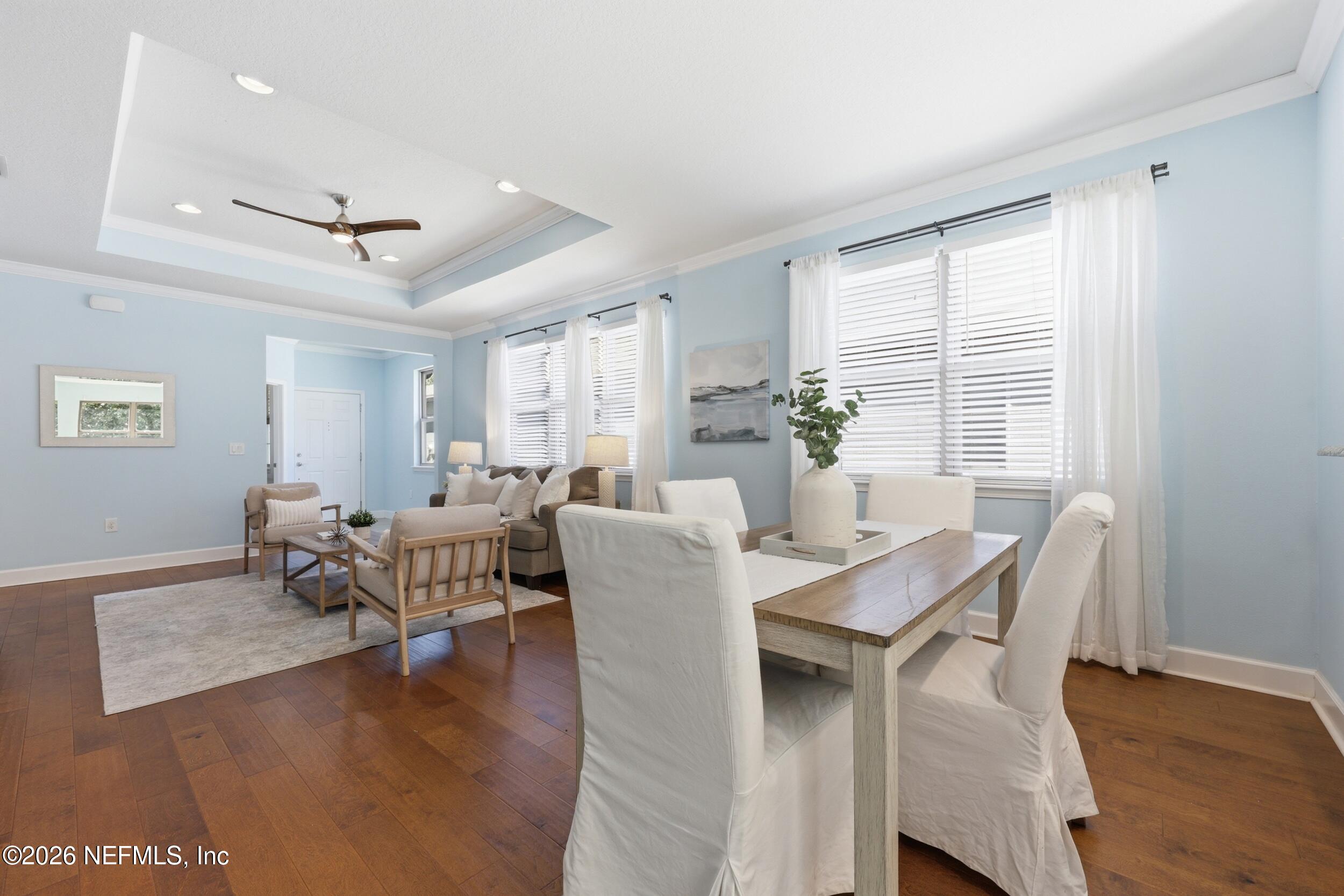 248 Hawks Harbor Road Ponte Vedra, FL 32081 - Photo 17 of 60 a view of a dining room with furniture window and wooden floor