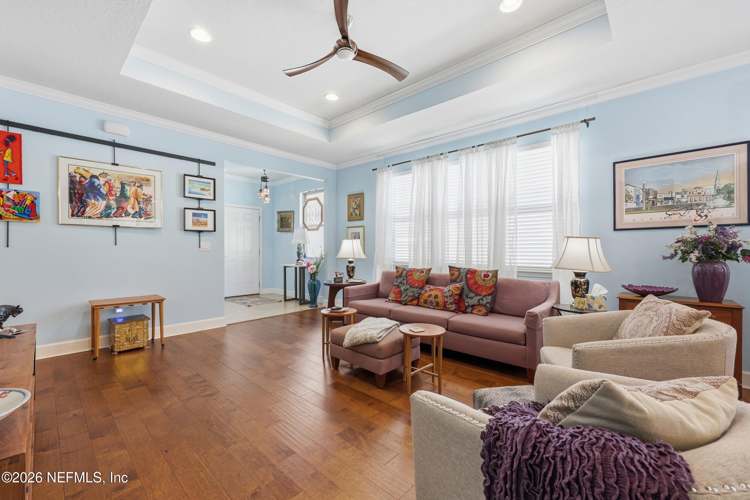 248 Hawks Harbor Road Ponte Vedra, FL 32081 - Photo 9 of 52 a living room with furniture and a window