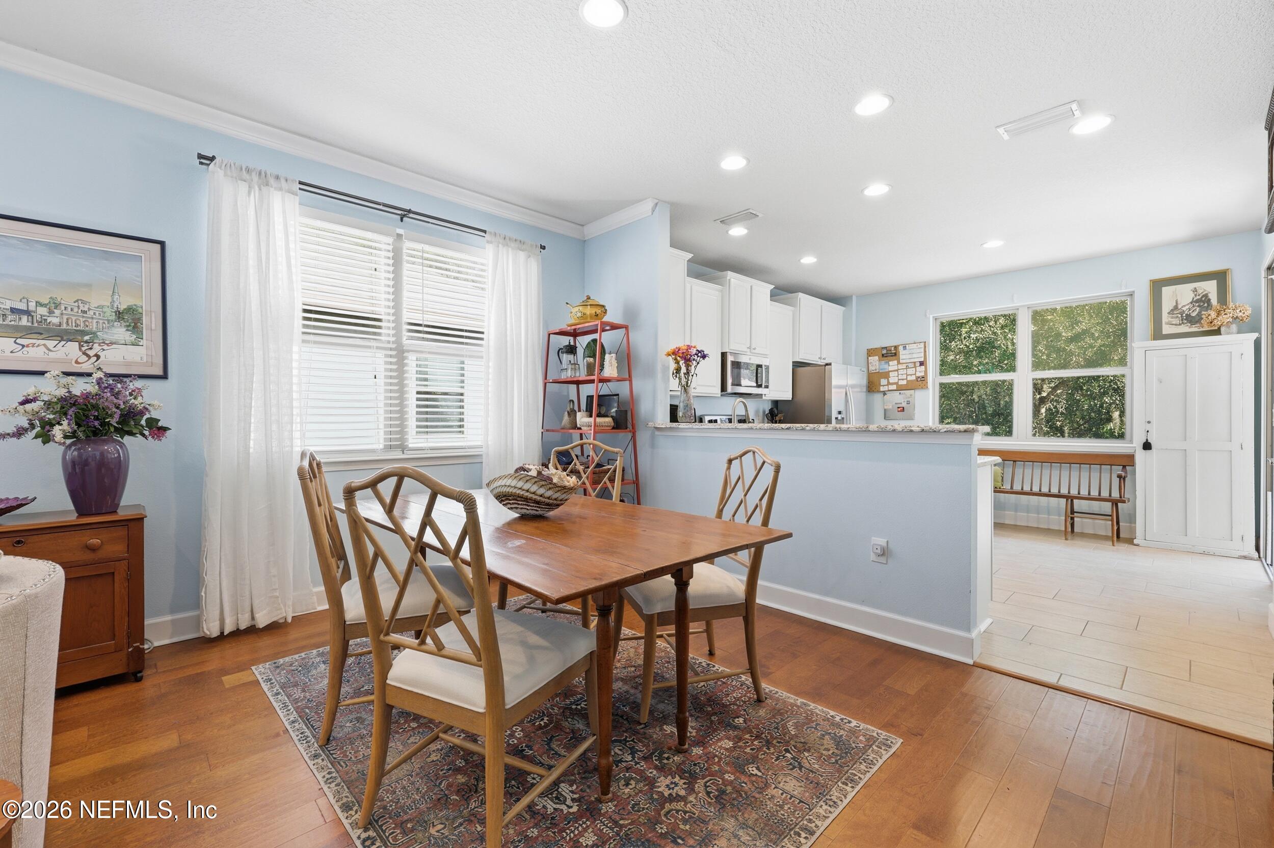 248 Hawks Harbor Road Ponte Vedra, FL 32081 - Photo 10 of 52 a dining room with furniture and window