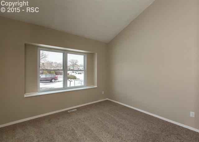 1730 Doherty Road Colorado Springs, CO 80916 - Photo 16 of 32 Master bedroom is on the main level