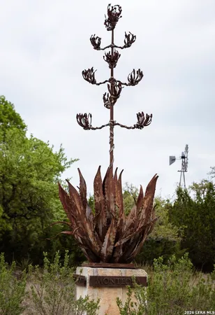 a view of a vase of flowers sitting on a table