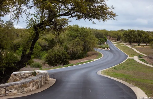 a view of a swimming pool with a porch