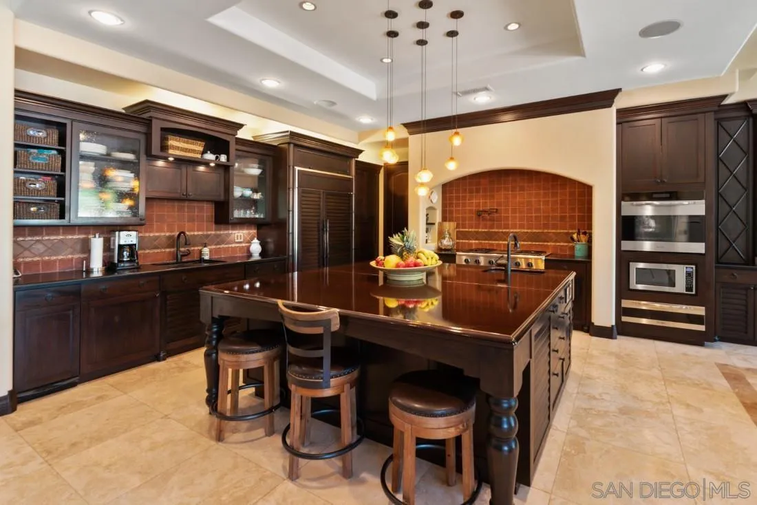 13862 Deergrass Court Poway, CA 92064 - Photo 11 of 51 a kitchen with a sink appliances and cabinets