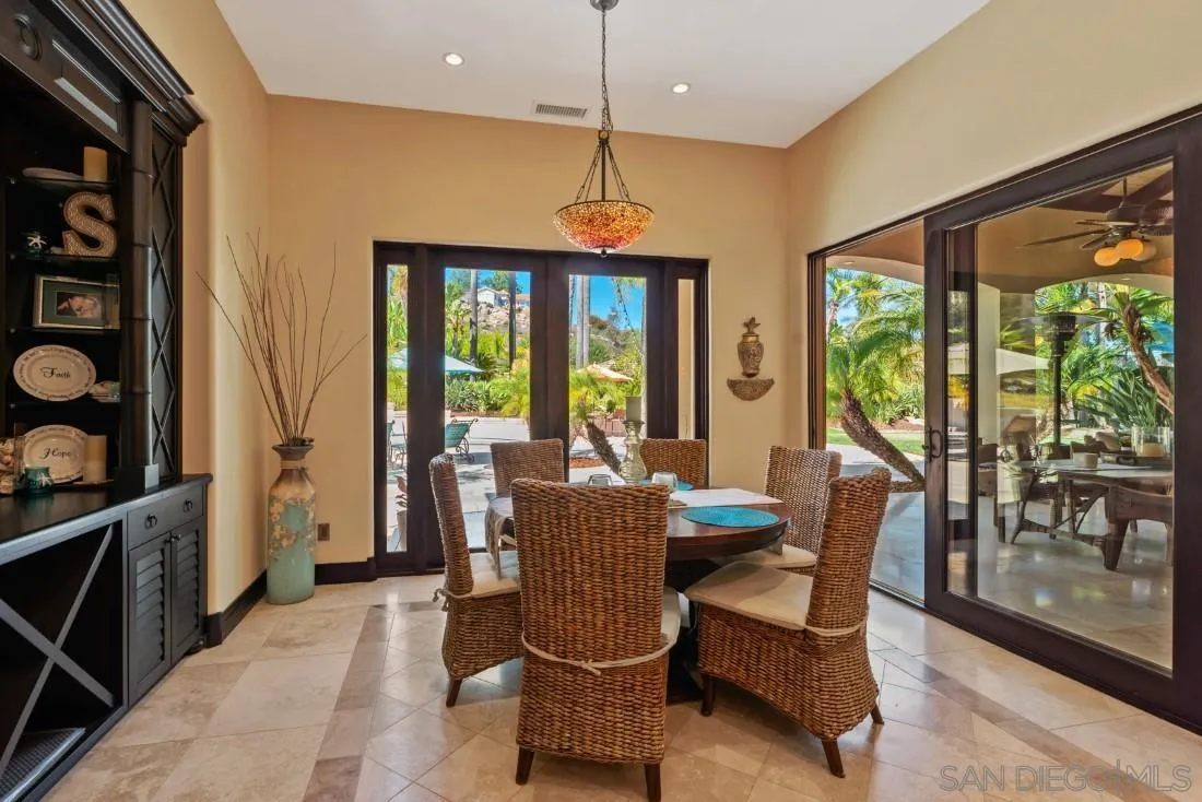 13862 Deergrass Court Poway, CA 92064 - Photo 15 of 51 a dining room with furniture window wooden floor