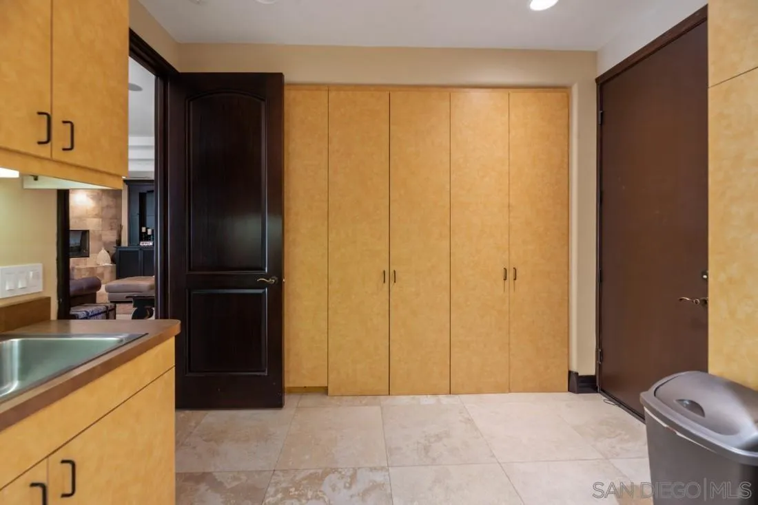 13862 Deergrass Court Poway, CA 92064 - Photo 21 of 51 a bathroom with a granite countertop sink and shower