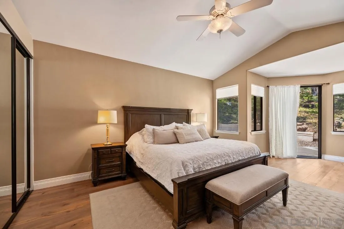 13862 Deergrass Court Poway, CA 92064 - Photo 23 of 51 a bedroom with a bed and window
