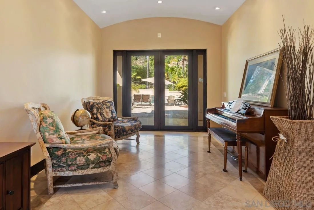 13862 Deergrass Court Poway, CA 92064 - Photo 3 of 51 a living room with furniture and a large window