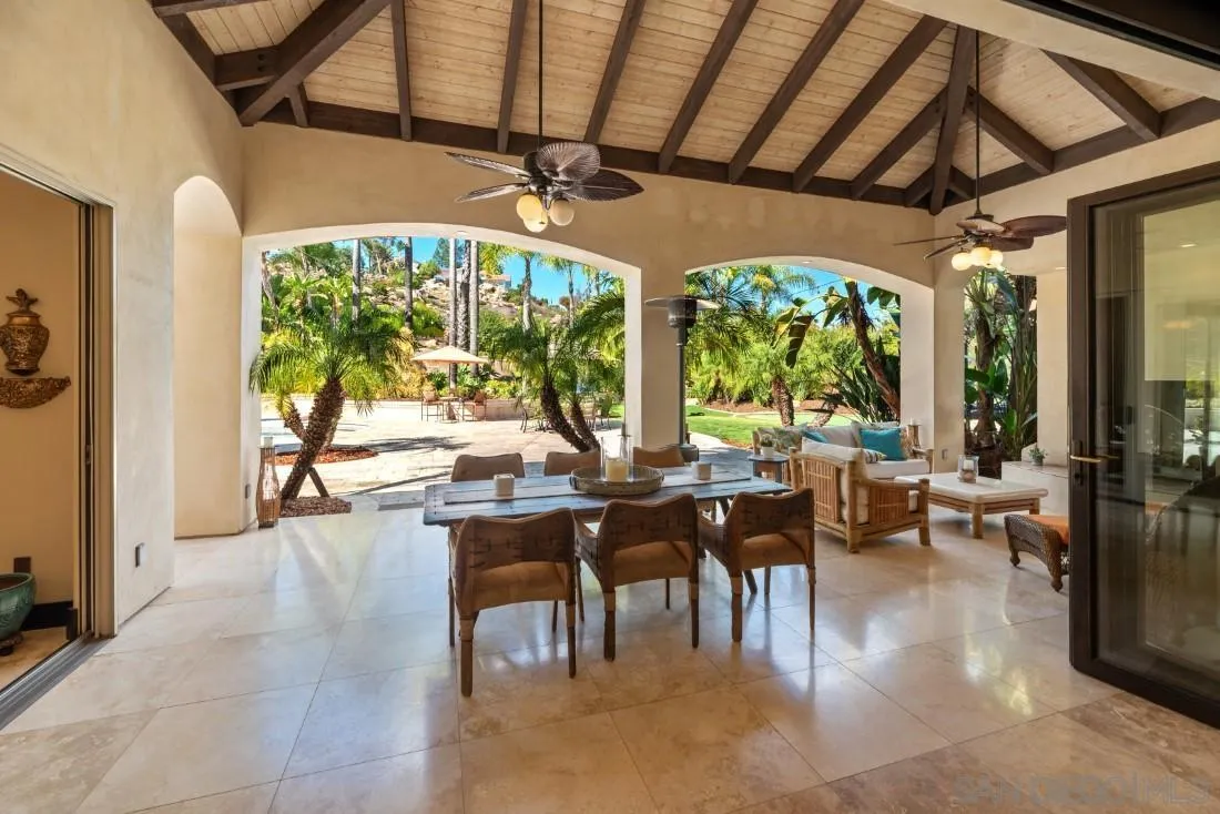 13862 Deergrass Court Poway, CA 92064 - Photo 39 of 51 a living room with large windows and furniture