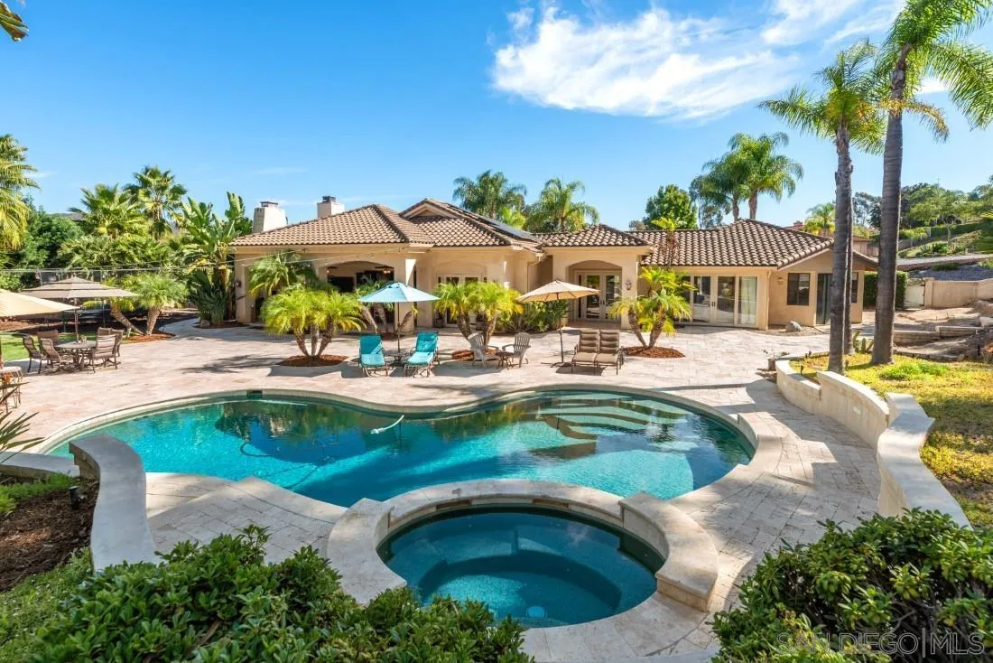 13862 Deergrass Court Poway, CA 92064 - Photo 40 of 51 a view of a swimming pool with a patio