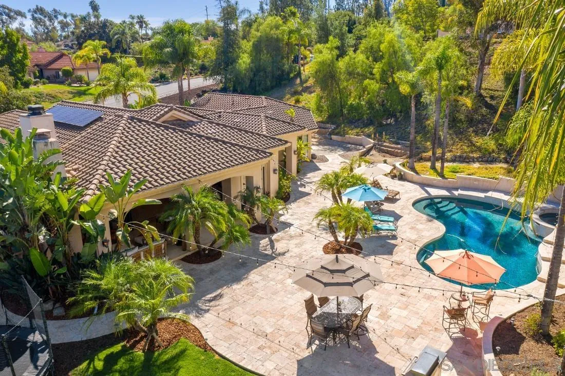 13862 Deergrass Court Poway, CA 92064 - Photo 41 of 51 a view of a patio with table and chairs and potted plants