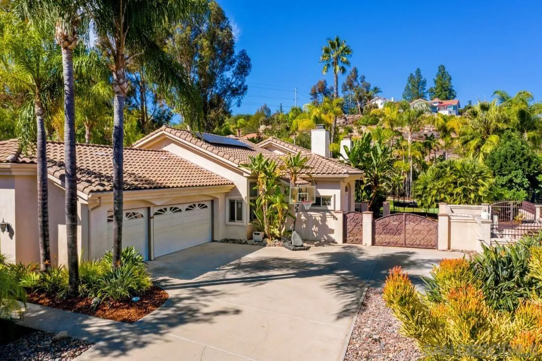 13862 Deergrass Court Poway, CA 92064 - Photo 49 of 51 a front view of a house with a yard