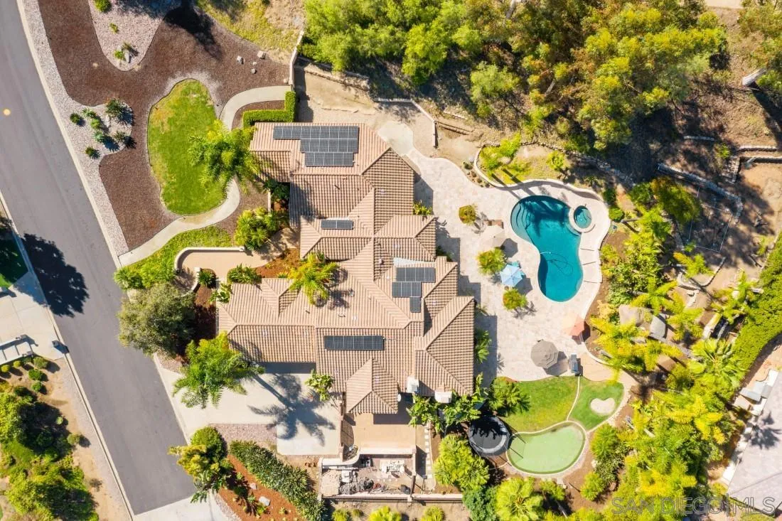 13862 Deergrass Court Poway, CA 92064 - Photo 51 of 51 an aerial view of a residential house with yard and parking