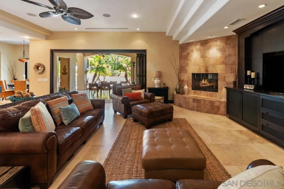 13862 Deergrass Court Poway, CA 92064 - Photo 6 of 51 a living room with furniture and a flat screen tv