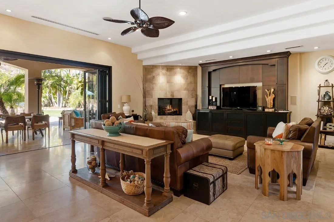 13862 Deergrass Court Poway, CA 92064 - Photo 7 of 51 a living room with furniture and a flat screen tv