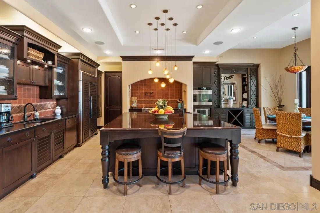 13862 Deergrass Court Poway, CA 92064 - Photo 10 of 51 a view of a dining room with furniture