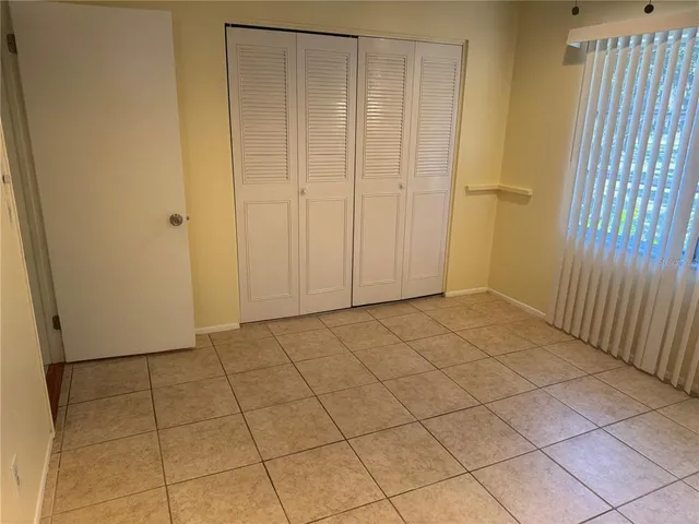 a bathroom with a toilet and shower