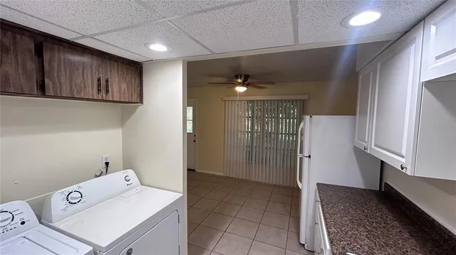 a view of a storage & utility room with a sink