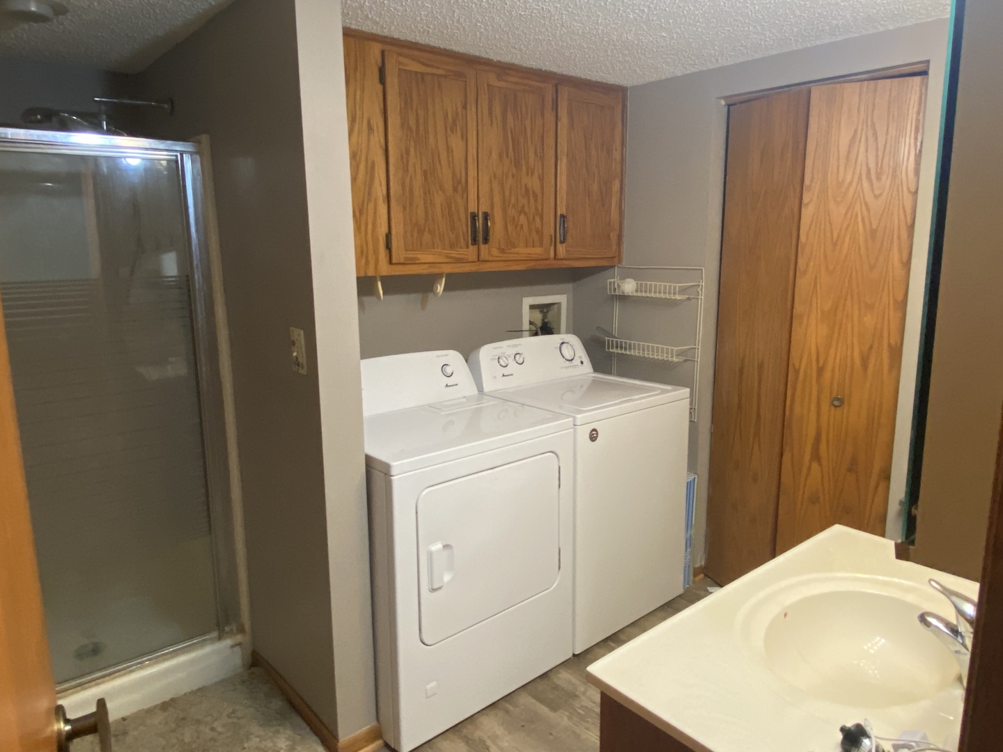 1105 East Division Street, Unit 1B Lockport, IL 60441 - Photo 11 of 22 a utility room with dryer and washer
