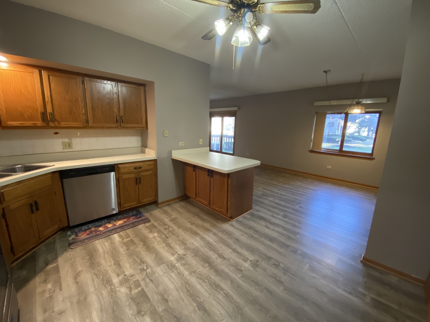 1105 East Division Street, Unit 1B Lockport, IL 60441 - Photo 6 of 22 a spacious bathroom with a sink a large mirror and a window