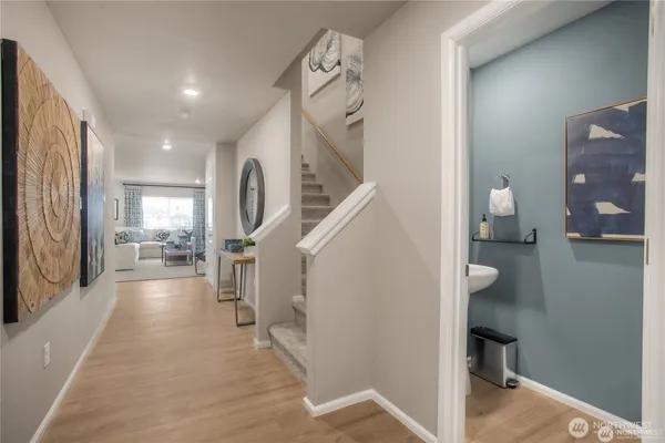 a view of a hallway view with staircase