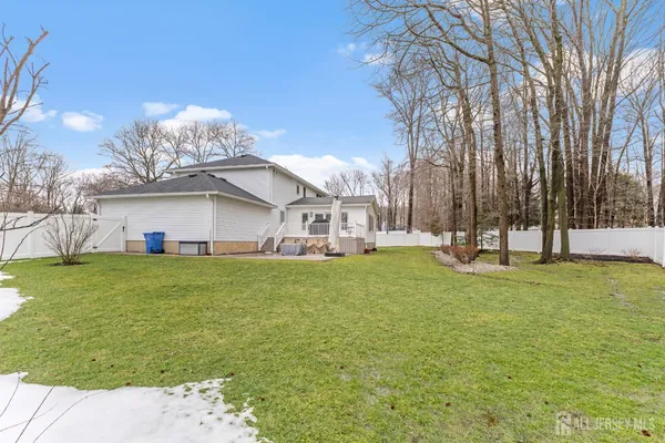an aerial view of residential house and parking space