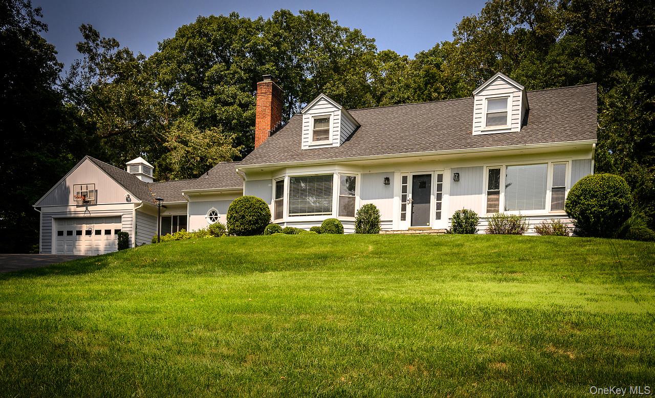 36 Pond Hill Road Chappaqua, NY 10514 - Photo 1 of 32 a front view of house with yard and green space