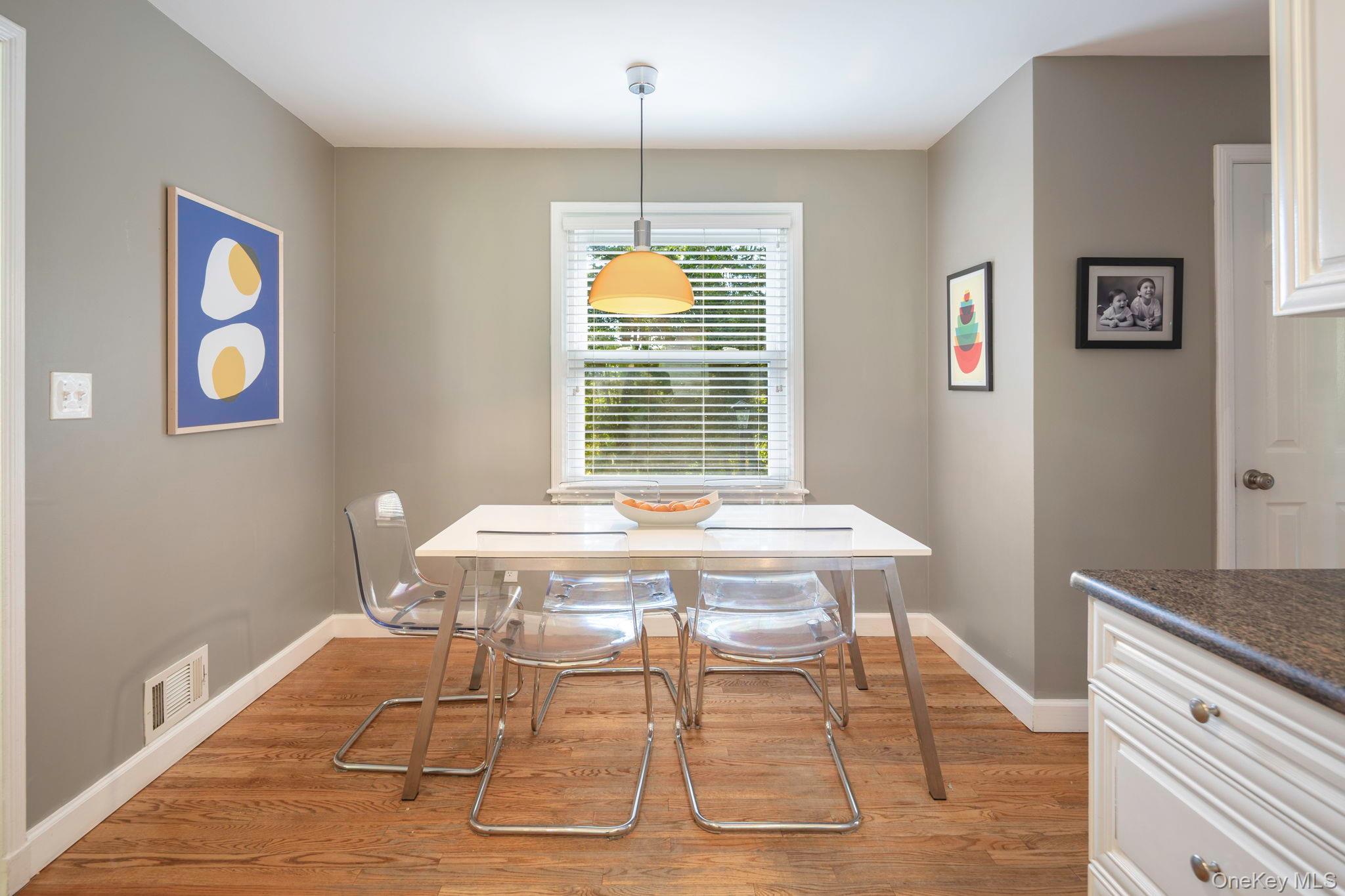 36 Pond Hill Road Chappaqua, NY 10514 - Photo 13 of 32 a view of a dining room with furniture window and wooden floor
