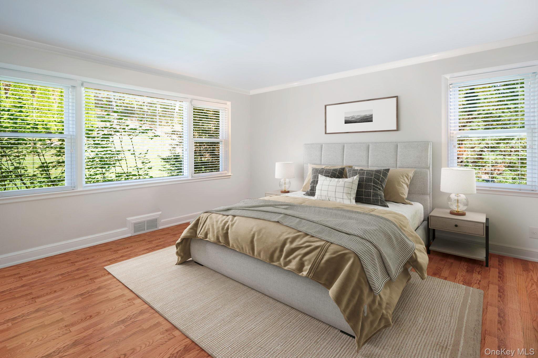 36 Pond Hill Road Chappaqua, NY 10514 - Photo 16 of 32 a bedroom with a large bed and a large window