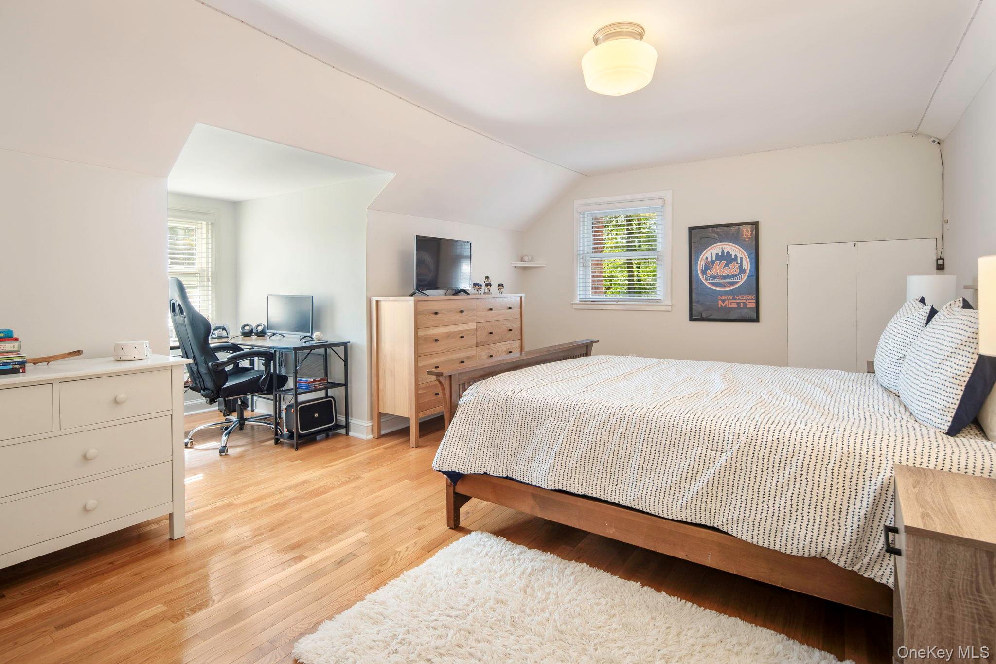 36 Pond Hill Road Chappaqua, NY 10514 - Photo 19 of 32 a bedroom with a bed and furniture