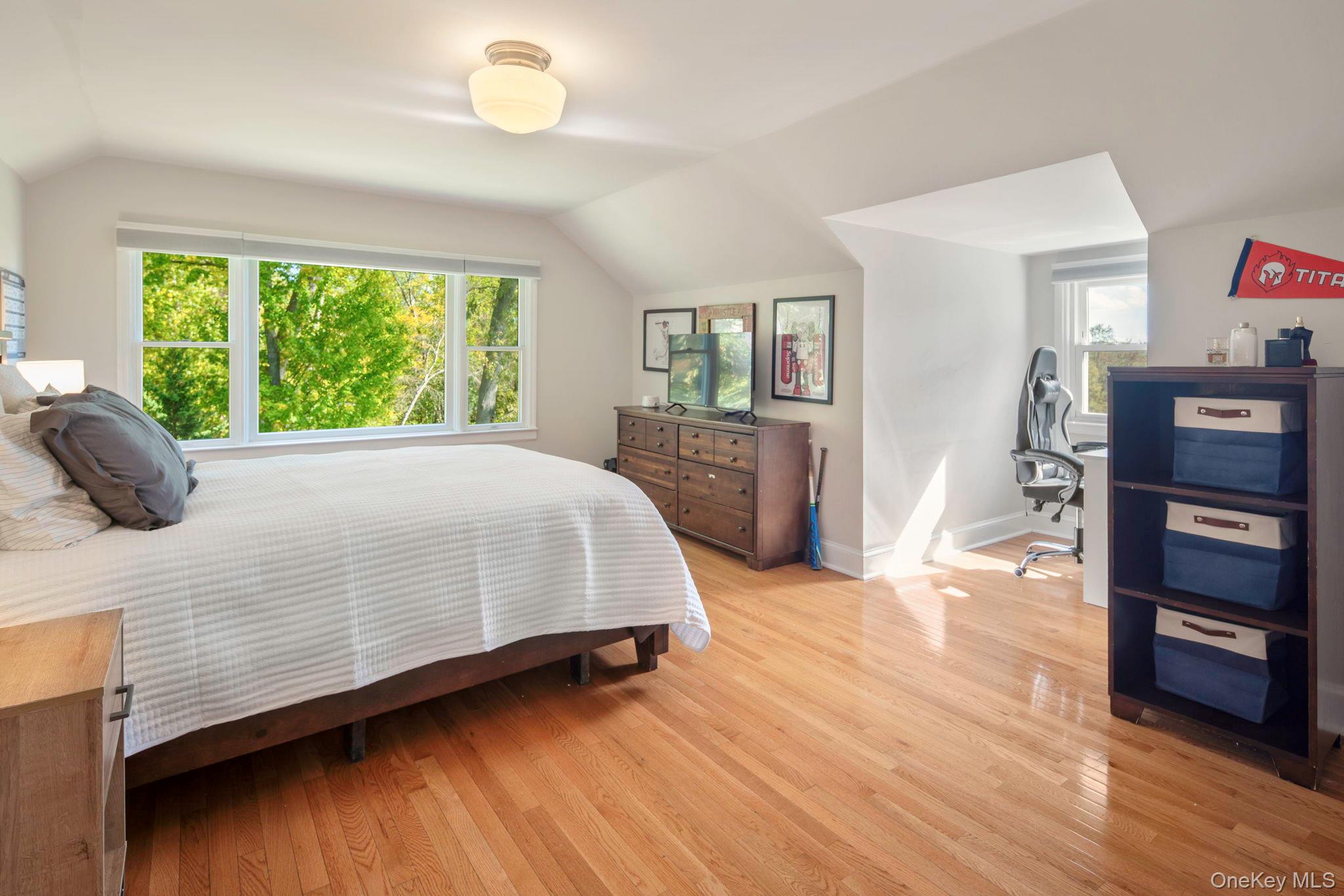 36 Pond Hill Road Chappaqua, NY 10514 - Photo 21 of 32 a bedroom with a bed and a dresser